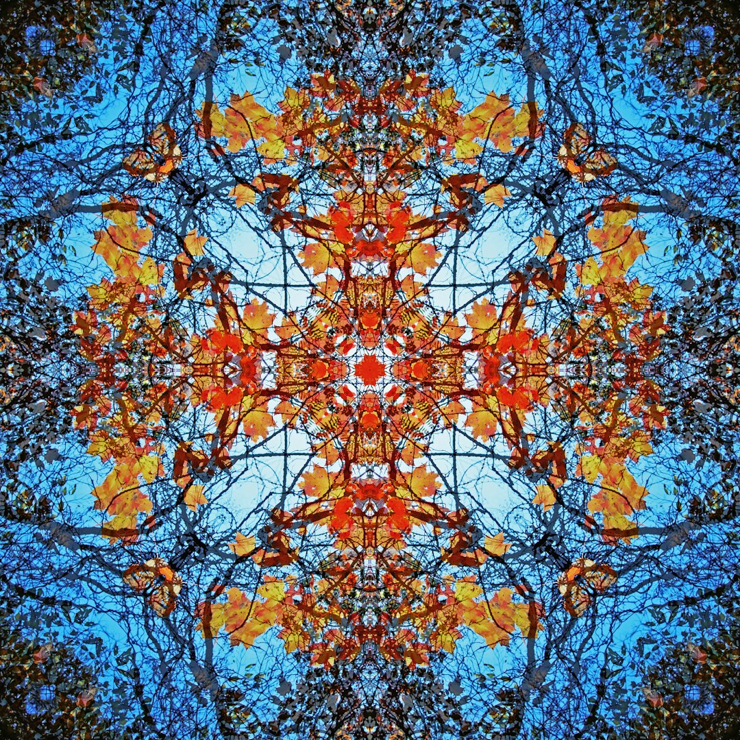 A seamless Hex symmetry wallpaper pattern featuring blue crystalline facets and golden geometric lines in a honeycomb layout. — base photo: A high-resolution macro shot of abstract geometric forms, featuring sharp blue planes, intersecting 