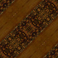 A close-up of geometric origami folds arranged in a repeating diamond symmetry pattern on wallpaper.