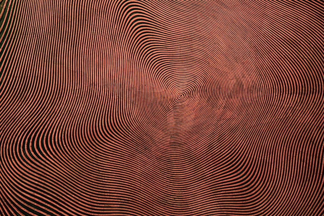 Seamless brick wallpaper pattern — Cartography by wallpaper⁶ — base photo: a red and black background with wavy lines