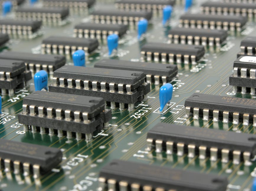 Self-adhesive wallpaper featuring a kaleidoscope pattern derived from a macro photograph of electronic circuit boards and components. — base photo: A highly detailed macro photograph capturing the intricate beauty of electronic components on a moth