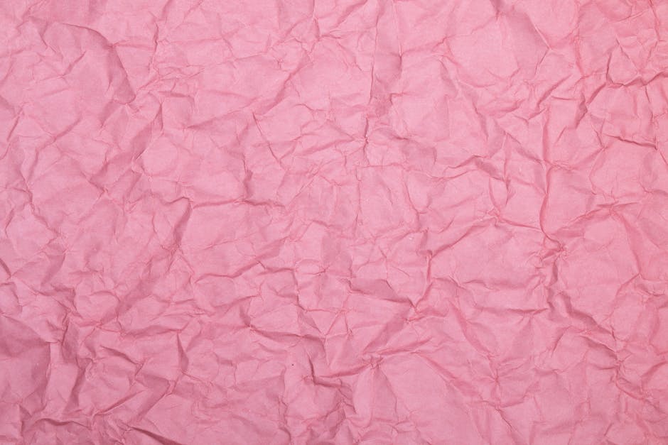 Seamless diamond wallpaper pattern — Origami by wallpaper⁶ — base photo: High-resolution close-up of a wrinkled pink paper texture, ideal for design use.