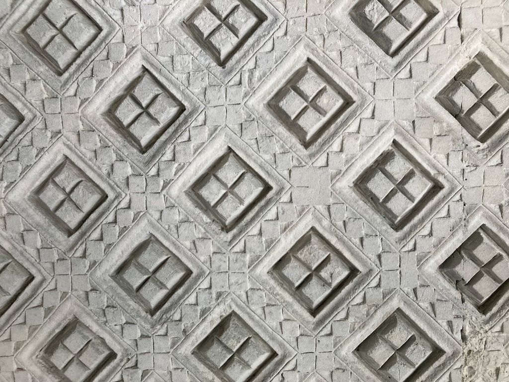 Seamless mirror wallpaper pattern — Geometry by wallpaper⁶ — base photo: a close up of a wall with a pattern on it