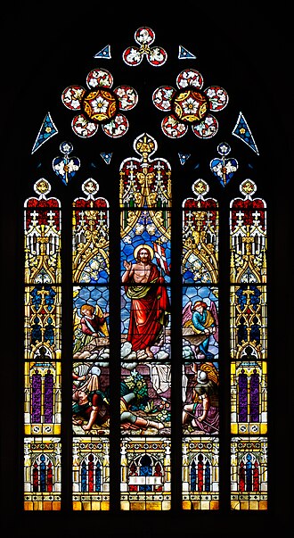 Gothic Rose pattern with hexagonal symmetry, inspired by stained glass windows, in shades of blue, red, and yellow. — base photo: A close-up detail of a Gothic rose window, featuring segments of deep blues, reds, and yellows arran