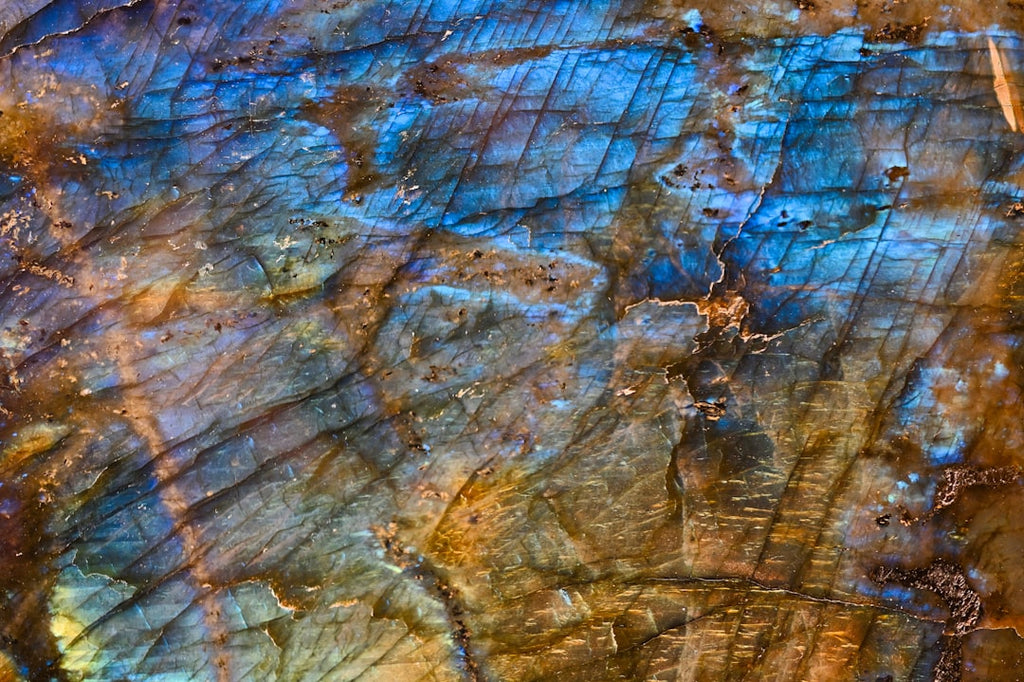 Abstract blue and brown mineralogy pattern in kaleidoscope symmetry, derived from a gemstone close-up. — base photo: A close-up, abstract view of blue and brown gemstone textures, resembling an abstract painting with 