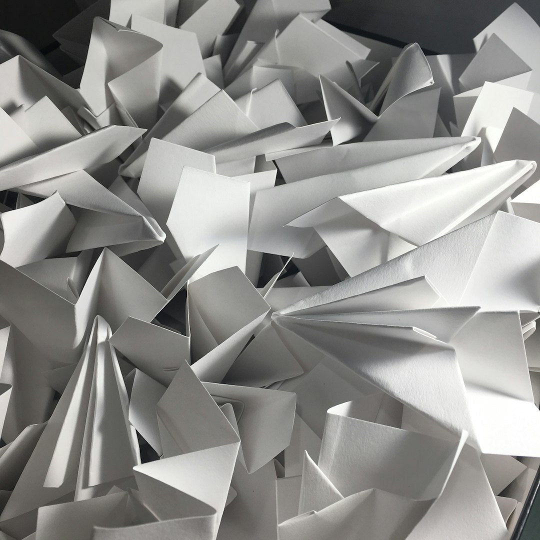 Seamless kaleidoscope wallpaper pattern — Origami by wallpaper⁶ — base photo: Paper aeroplanes