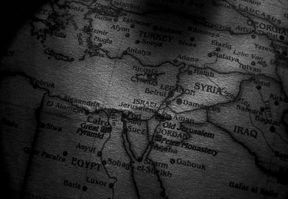 Data Rotation wallpaper pattern — base photo: Close-up grayscale image of a map showing countries in the Middle East, including Egypt, Syria, and 