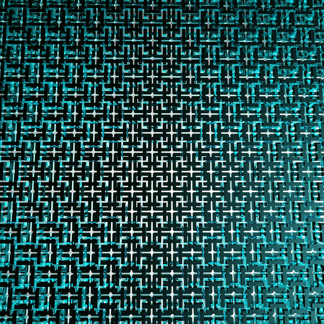 Molecular Physics Kaleidoscope wallpaper pattern — base photo: a blue and black wall with a pattern on it