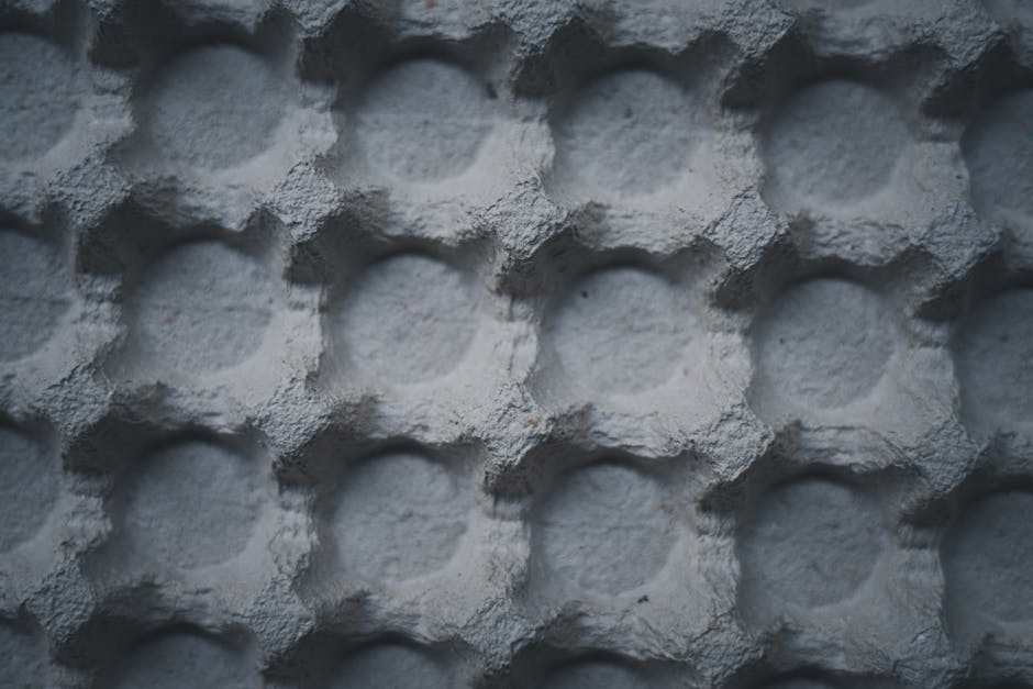 Seamless diamond wallpaper pattern — Glitch by wallpaper⁶ — base photo: Detailed macro shot of rough textured empty egg carton highlighting its pattern.