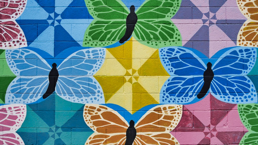 Entomology Mirror wallpaper pattern — base photo: multicolored butterfly print wallpaper