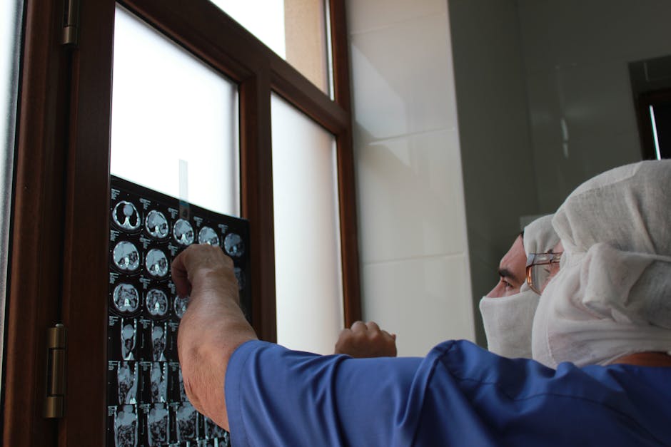Seamless mirror wallpaper pattern — Medicine by wallpaper⁶ — base photo: A doctor examines an X-ray film by the window in a medical clinic.