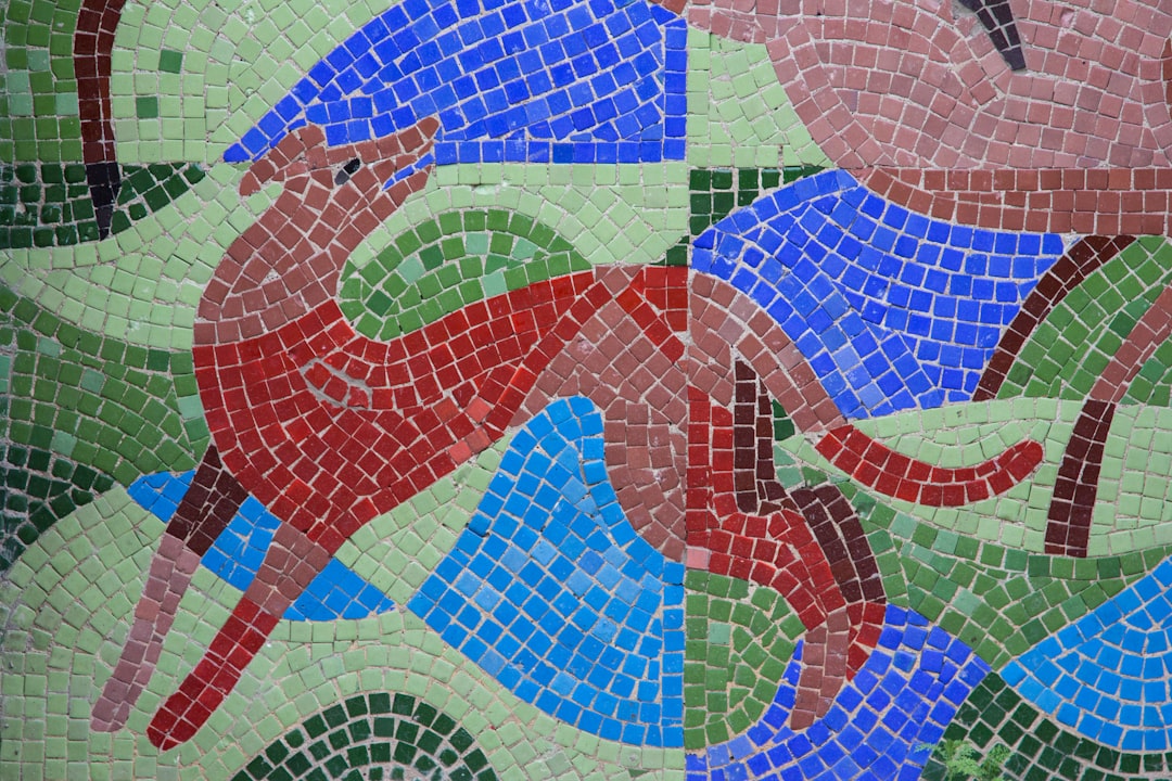 Seamless mirror wallpaper pattern — Origami by wallpaper⁶ — base photo: a close up of a mosaic with horses