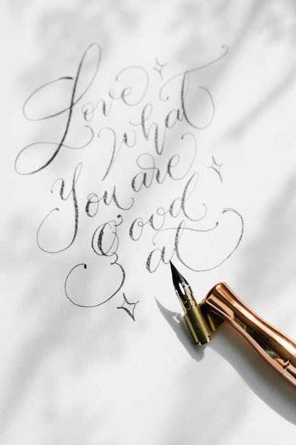 Seamless kaleidoscope wallpaper pattern — Calligraphy by wallpaper⁶ — base photo: A close-up of artistic cursive calligraphy on white paper with a gold dip pen.