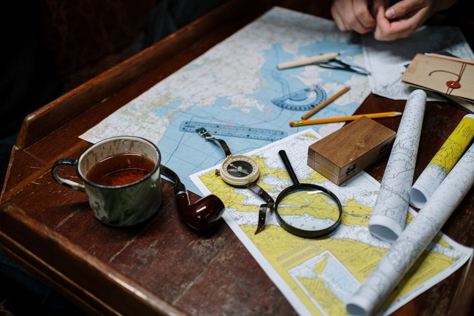 Meteorology Hexagon wallpaper pattern — base photo: Overhead view of navigation tools with maps, compass, and coffee cup.