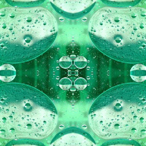 Abstract mirror pattern of green oil and water bubbles, resembling a scientific microscopic view, on wallpaper.