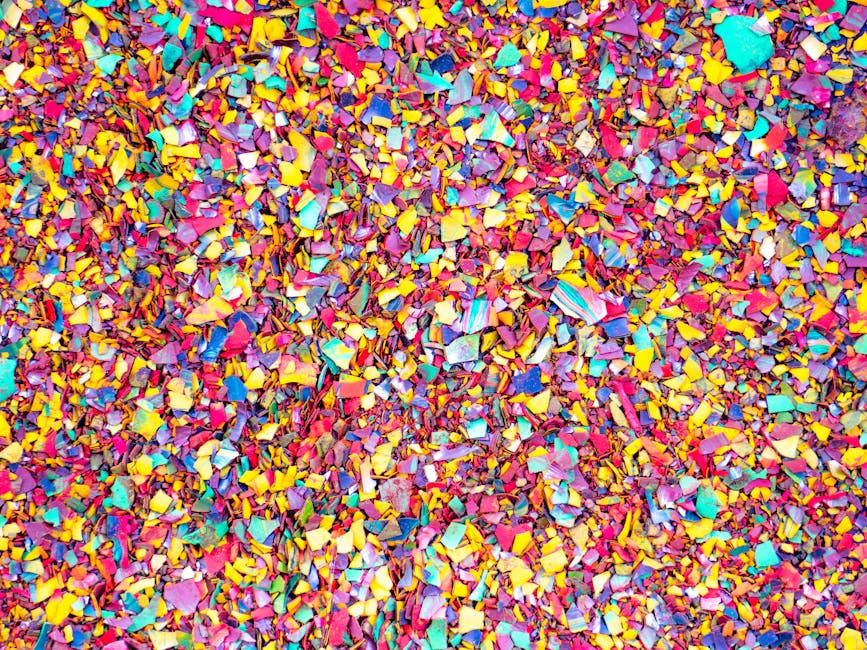 Seamless diamond wallpaper pattern — Origami by wallpaper⁶ — base photo: A close-up view of an abstract, vibrant background composed of colorful paper scraps, showcasing cre