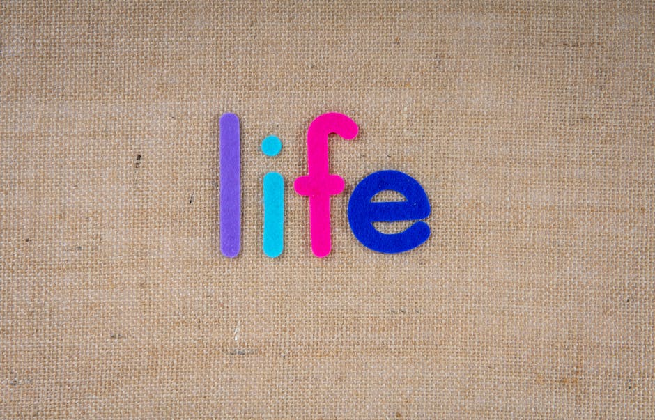 Seamless hex wallpaper pattern — Calligraphy by wallpaper⁶ — base photo: Colorful felt letters spell 'life' on a textured burlap background, offering ample copy space.