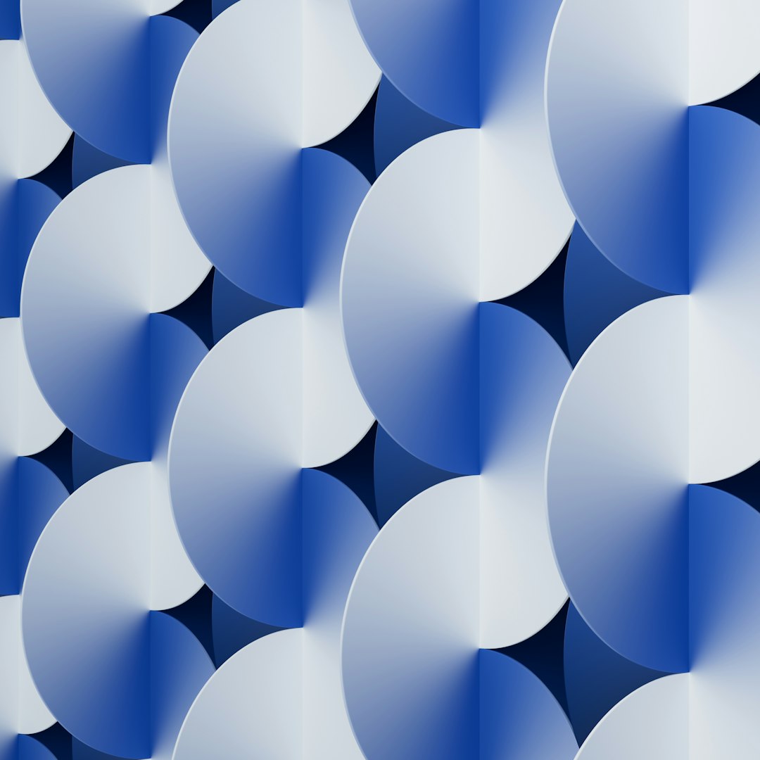 A black and white Op-Art pattern with Kaleidoscope symmetry featuring radiating star-like shapes and vibrating lines. — base photo: A high-contrast macro photograph of layered monochrome architectural fins and curved linear shadows,