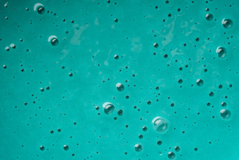 Physics Wave wallpaper pattern — base photo: Abstract close-up of turquoise liquid with bubbles, showcasing texture and pattern.