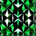 A seamless pattern of yellow and black origami squares arranged symmetrically, featuring mirror symmetry, ideal for wallpaper.