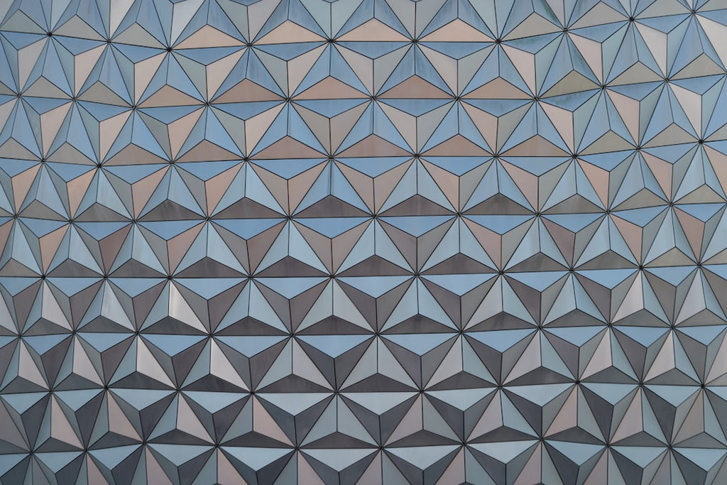 Seamless kaleidoscope wallpaper pattern — Biochemistry by wallpaper⁶ — base photo: a close up of a building with many different shapes
