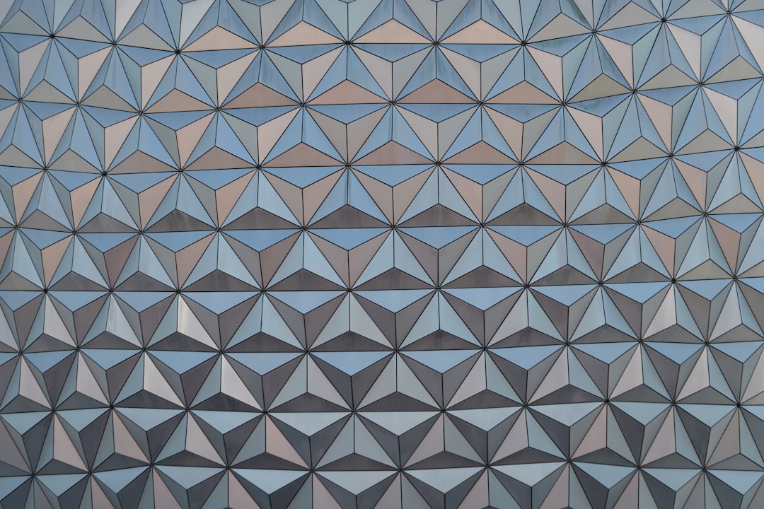 Seamless kaleidoscope wallpaper pattern — Biochemistry by wallpaper⁶ — base photo: a close up of a building with many different shapes