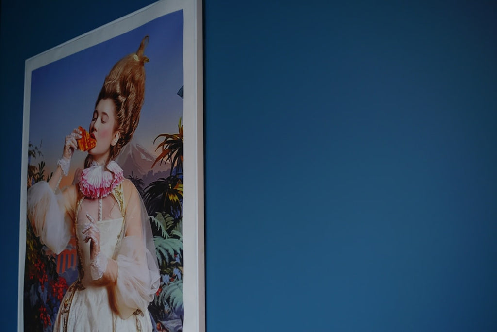 Portraits Hexagon wallpaper pattern — base photo: Woman in elaborate wig drinks from orange