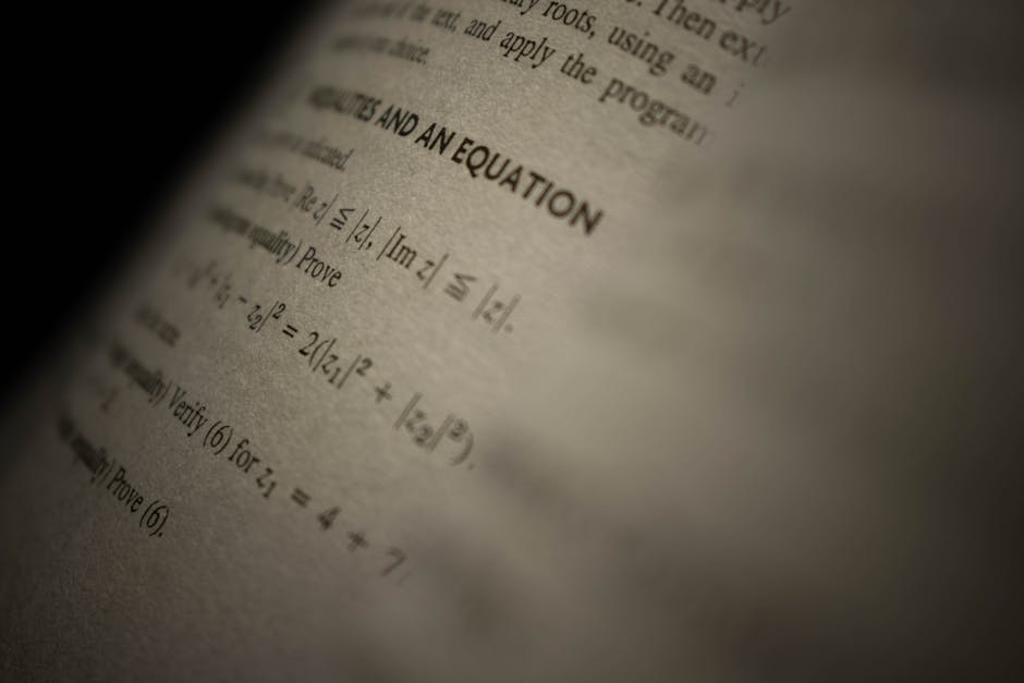Seamless rotation wallpaper pattern — Algebra by wallpaper⁶ — base photo: Selective focus on a mathematics textbook page with complex equations and text.