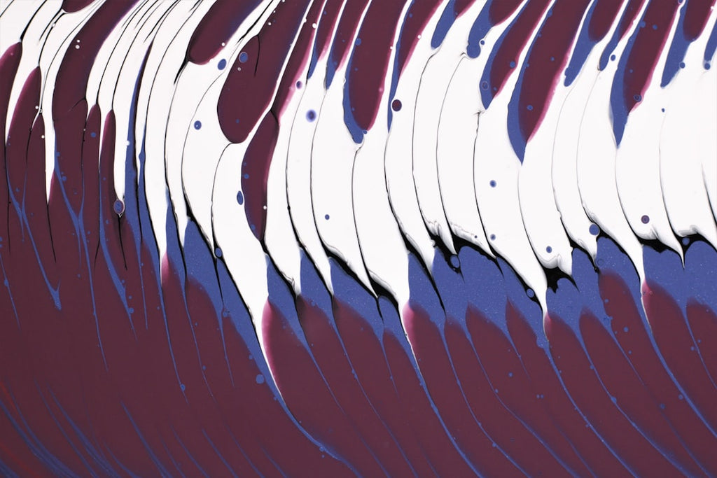 Abstract red and white acrylic pour waves with mirror symmetry, a dynamic fluid art pattern for wallpaper. — base photo: A vibrant close-up showcasing the mesmerizing textures and organic flow of an acrylic pour. Vivid re