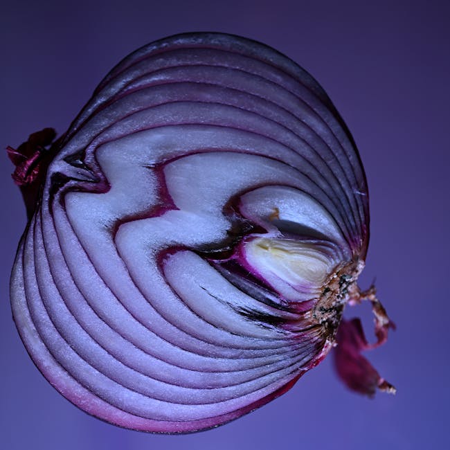 Seamless kaleidoscope wallpaper pattern — Medicine by wallpaper⁶ — base photo: Artistic close-up of a sliced red onion revealing its texture and layers against a purple backdrop.