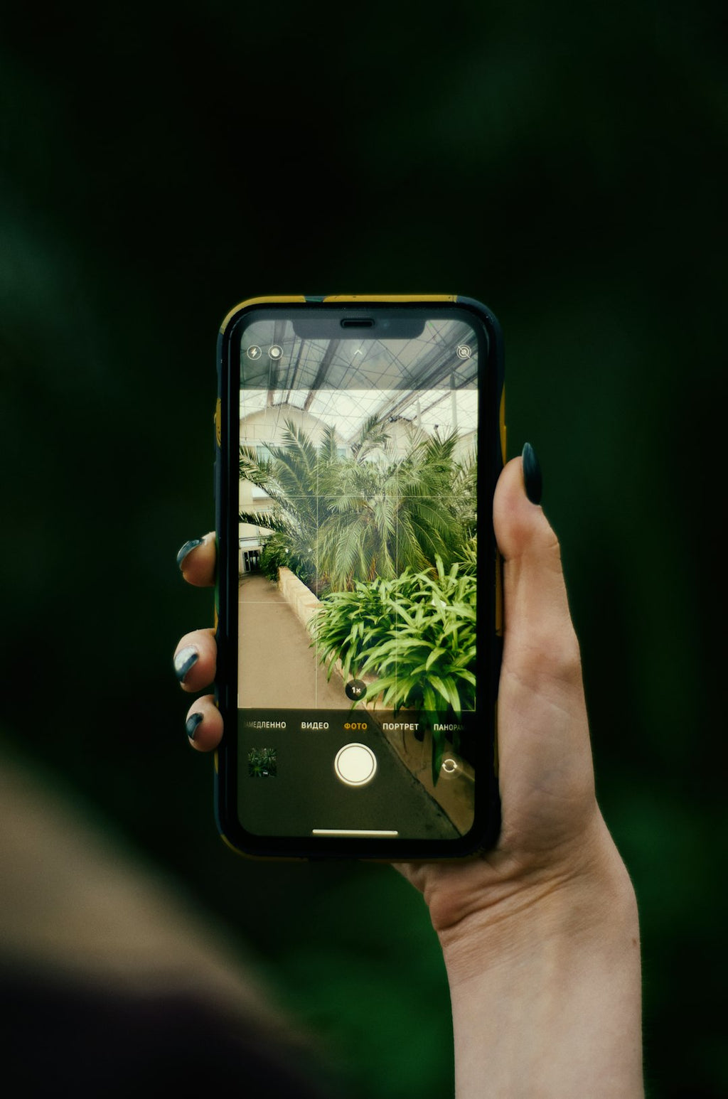 Seamless mirror wallpaper pattern — Glitch by wallpaper⁶ — base photo: a hand holding a cellphone
