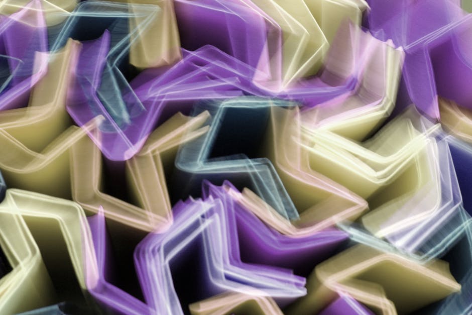 Seamless diamond wallpaper pattern — Origami by wallpaper⁶ — base photo: Dynamic abstract image featuring vibrant, colorful geometric shapes in motion blur, creating a livel
