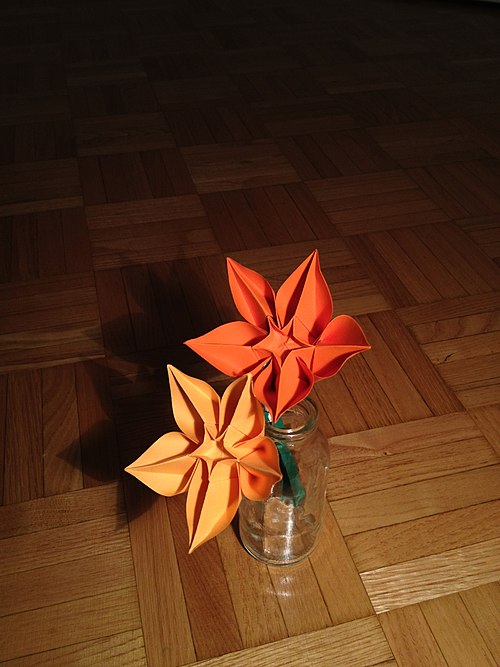 Seamless kaleidoscope wallpaper pattern — Origami by wallpaper⁶ — base photo: File:Bouquet of origami flower - Carambola.jpg