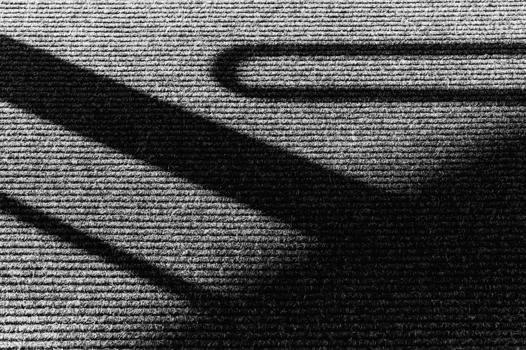 Seamless mirror wallpaper pattern — Glitch by wallpaper⁶ — base photo: the shadow of a computer mouse on a computer keyboard