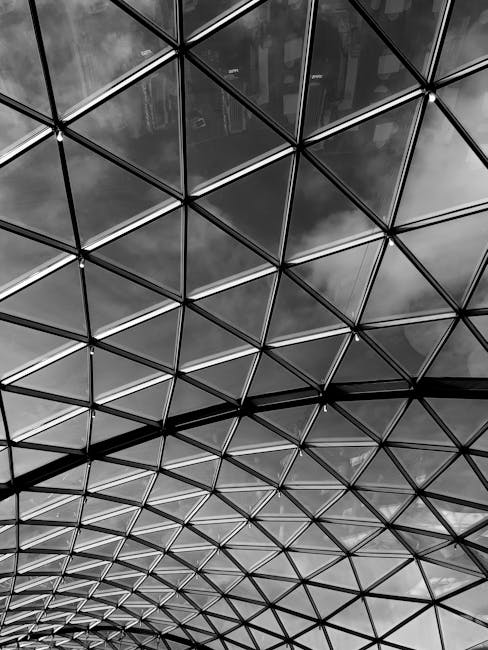 Seamless kaleidoscope wallpaper pattern — Geometry by wallpaper⁶ — base photo: Black and white geometric glass ceiling reflecting the cloudy sky.