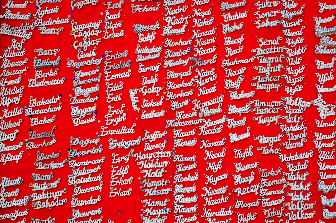 Seamless mirror wallpaper pattern — Calligraphy by wallpaper⁶ — base photo: white writings on wall