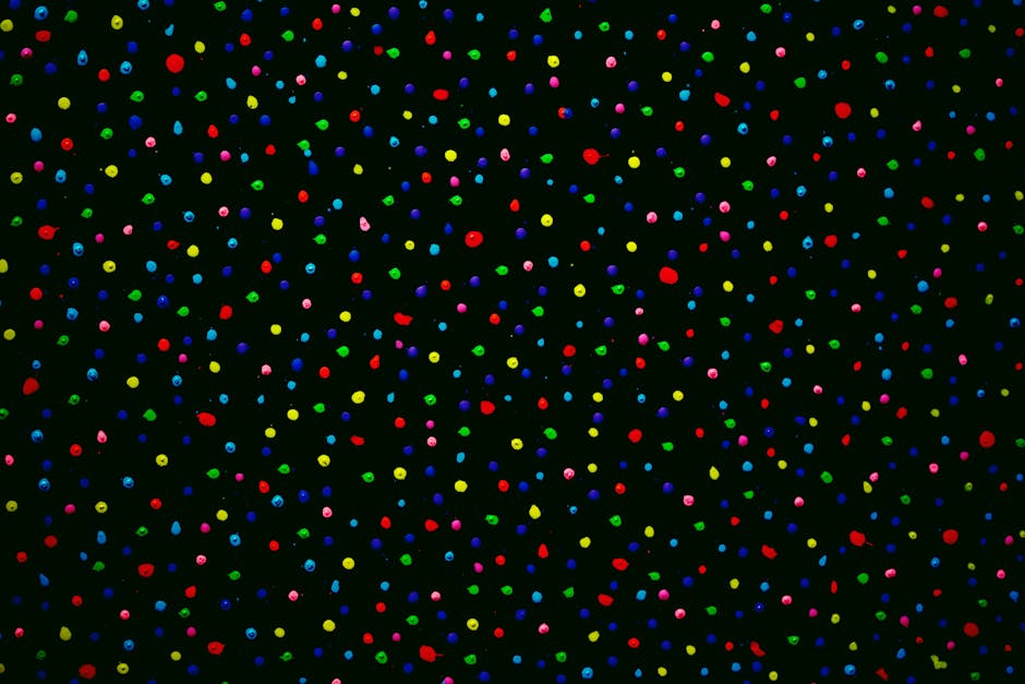 Seamless kaleidoscope wallpaper pattern — Cosmology by wallpaper⁶ — base photo: Vibrant abstract art with colorful dots scattered across a black background