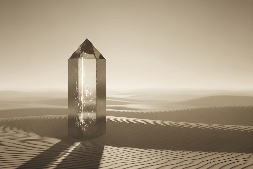 Seamless mirror wallpaper pattern — Geometry by wallpaper⁶ — base photo: A tall crystal stands in a desolate desert landscape