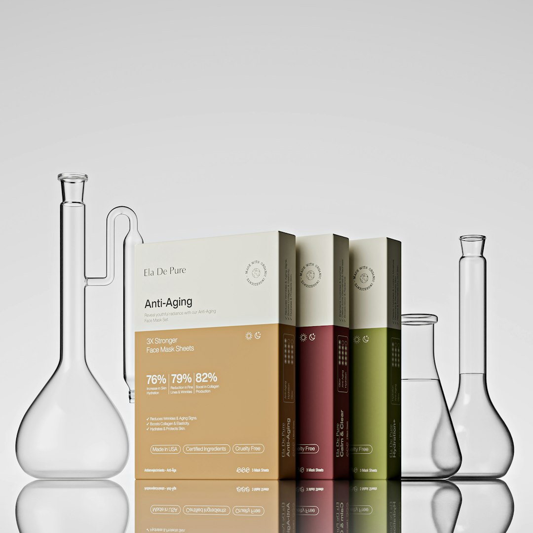 WALLPAPER⁶ — seamless kaleidoscope pattern from chemistry lab glassware, Chemistry — base photo: ChatGPT said: Elegant product display featuring Ela De Pure’s Anti-Aging Face Mask Sheets. The minim