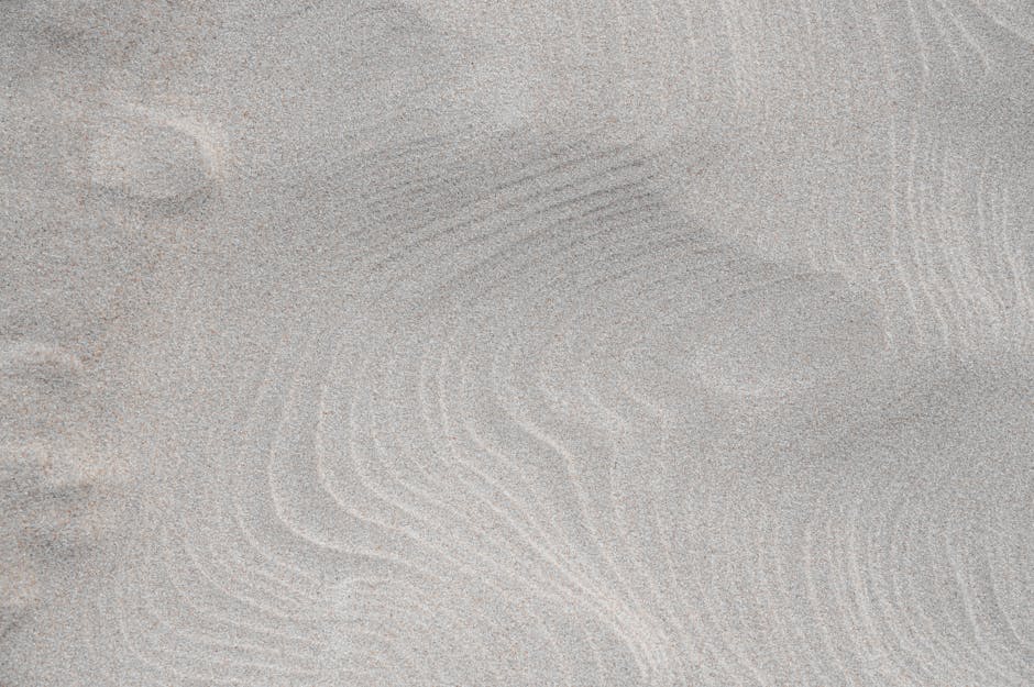 Statistics Horizontal Strip wallpaper pattern — base photo: Detailed close-up of white sand texture with natural patterns viewed in Leba, Poland.