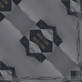 A seamless repeating pattern of precise origami folds arranged in a diamond symmetry, showcasing geometric precision.