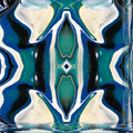 Abstract acrylic pour wallpaper with blue and white swirls in mirror symmetry. A design by Susan Wilkinson.