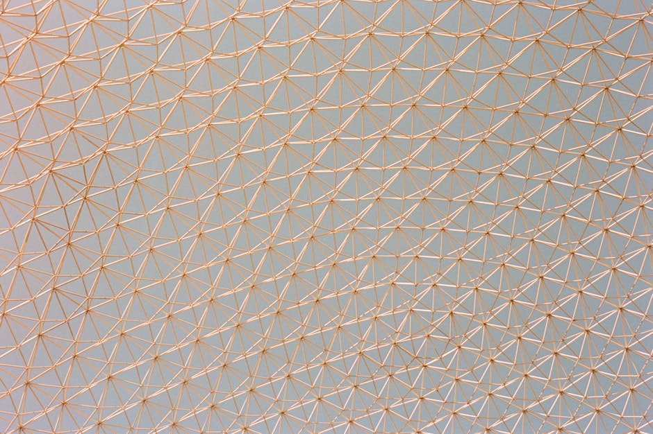 AI Art Brick wallpaper pattern — base photo: A detailed view of a geometric metal framework ceiling with triangular patterns.