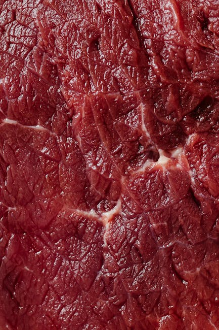 Mineralogy Kaleidoscope wallpaper pattern — base photo: Detailed macro shot highlighting the intricate texture and marbling of raw beef meat.