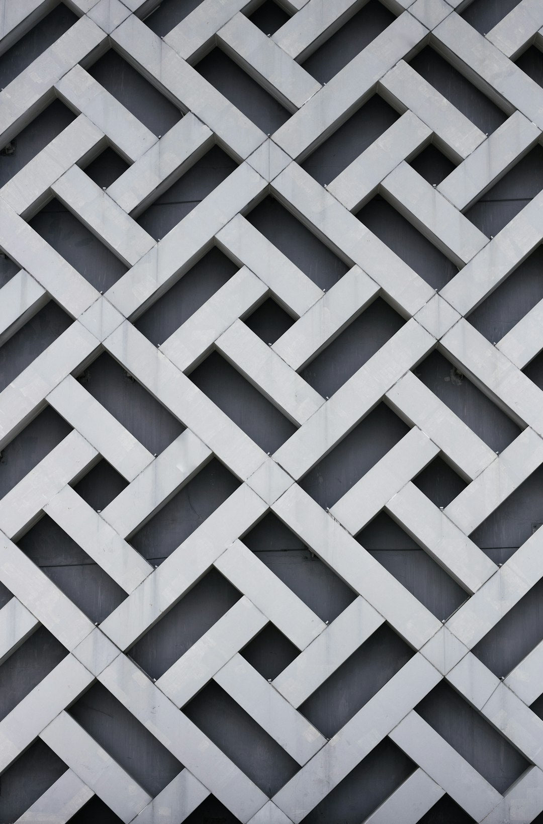 Seamless kaleidoscope wallpaper pattern — Geometry by wallpaper⁶ — base photo: gray concrete building during daytime