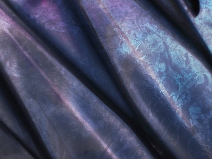 Close-up of abstract purple and blue AI-generated patterns with metallic shimmer, arranged in rotation symmetry on self-adhesive wallpaper. — base photo: A macro view captures the exquisite detail of a shimmering metallic fabric. Abstract patterns in ric