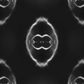 A monochromatic Rorschach-style mirror pattern created from a human portrait with high-contrast shadows and highlights.