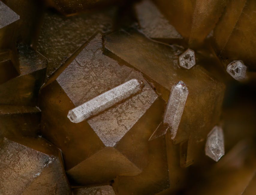 Molecular Physics Mirror wallpaper pattern — base photo: Detailed macro shot of brown crystal gemstone featuring translucent texture and intricate structure.