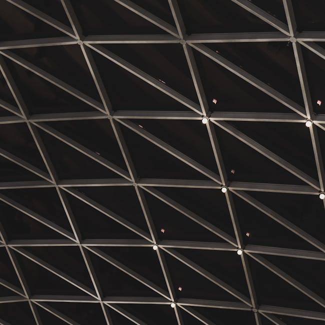 Seamless chevron wallpaper pattern — Origami by wallpaper⁶ — base photo: Abstract view of a geometric architectural ceiling structure with lighting.