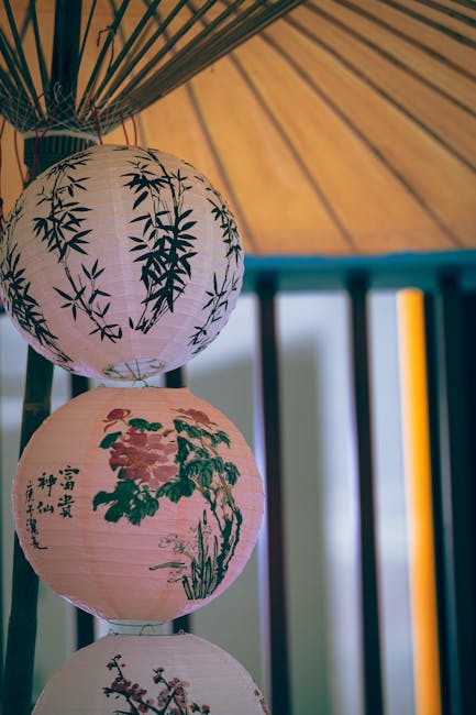 Seamless diamond wallpaper pattern — Origami by wallpaper⁶ — base photo: Colorful paper lanterns with artistic prints hanging under a traditional parasol.