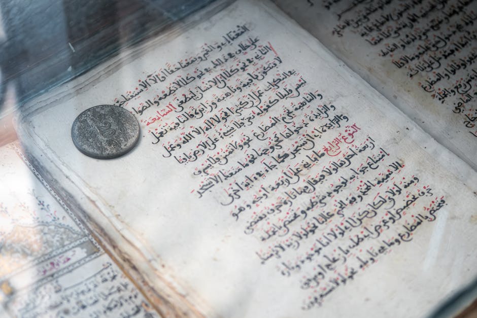 Seamless hex wallpaper pattern — Calligraphy by wallpaper⁶ — base photo: Detailed view of an ancient Arabic manuscript and old coin on display, showcasing Islamic calligraph